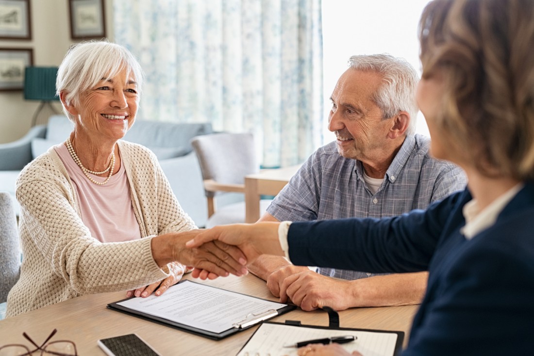 Senior care franchise sales consulting with a senior couple